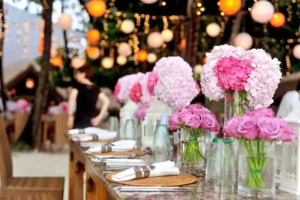 Evening wedding dinner table with soft lighting