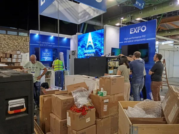 Exhibitor crews commissioning their stands at ECOC 2026, FYCMA Malaga
